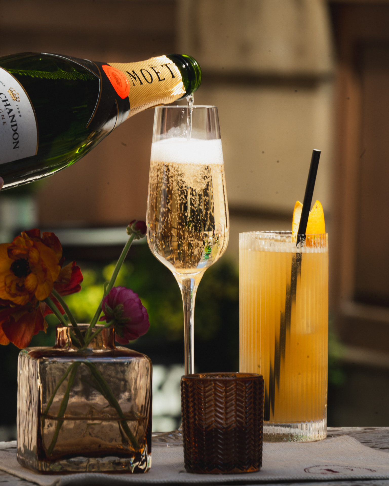 Moët champagne poured beside a cocktail at Federico