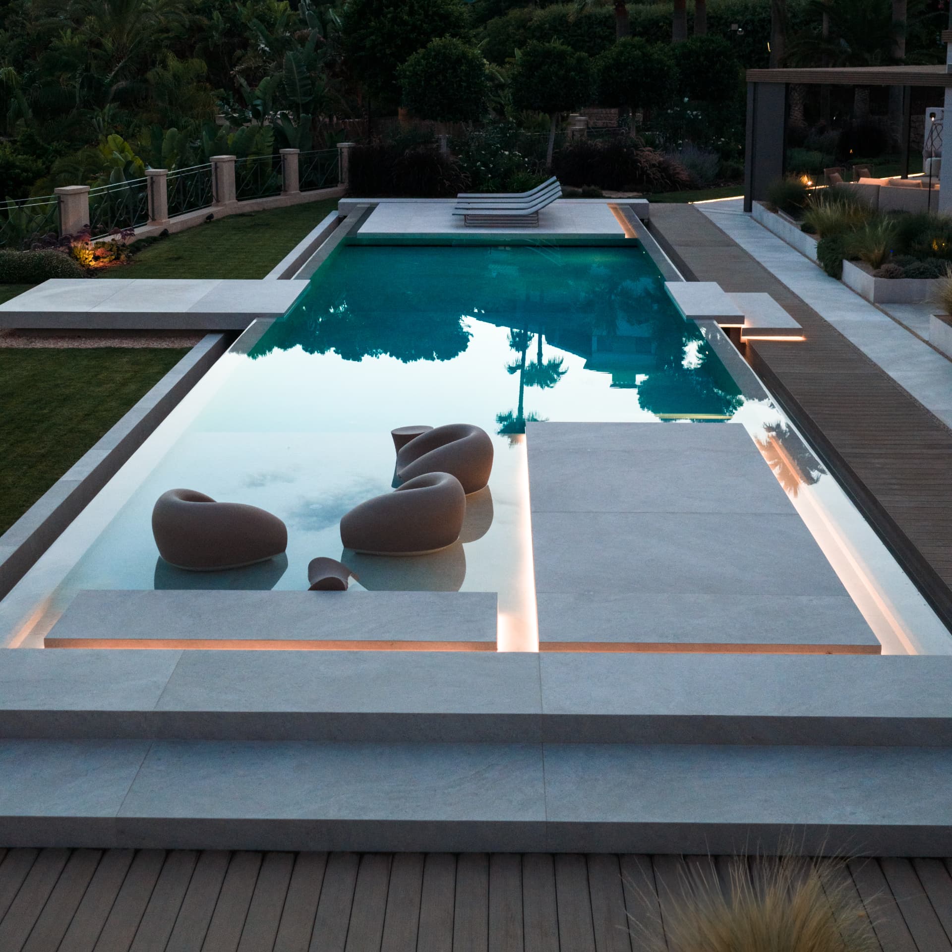 Las Brisas illuminated pool at blue hour