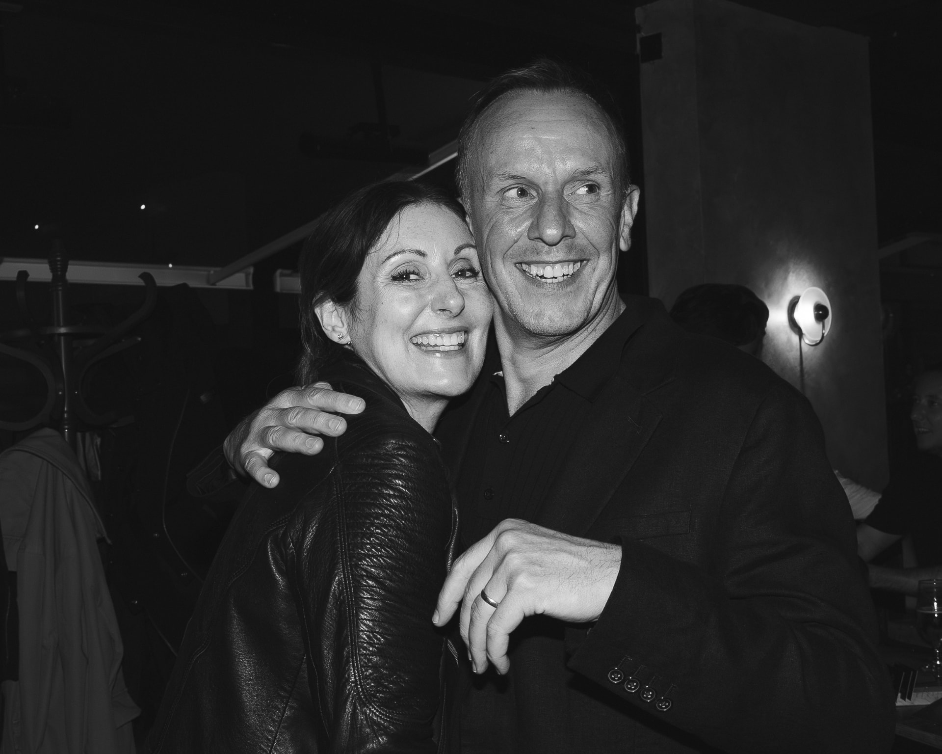 Guests laughing together at Federico's Oyster event